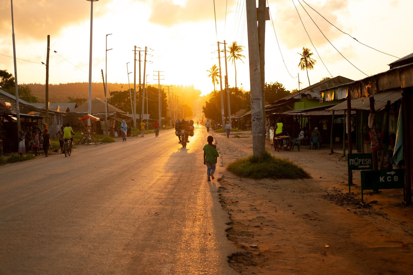 Quiet street in a Nigerian town at golden hour, representing Tafawa Balewa