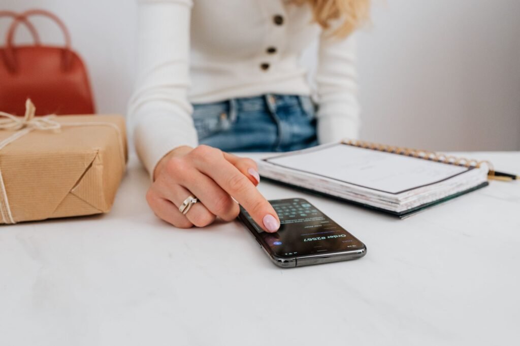 Smartphone and notebook on a desk ready for planning messages