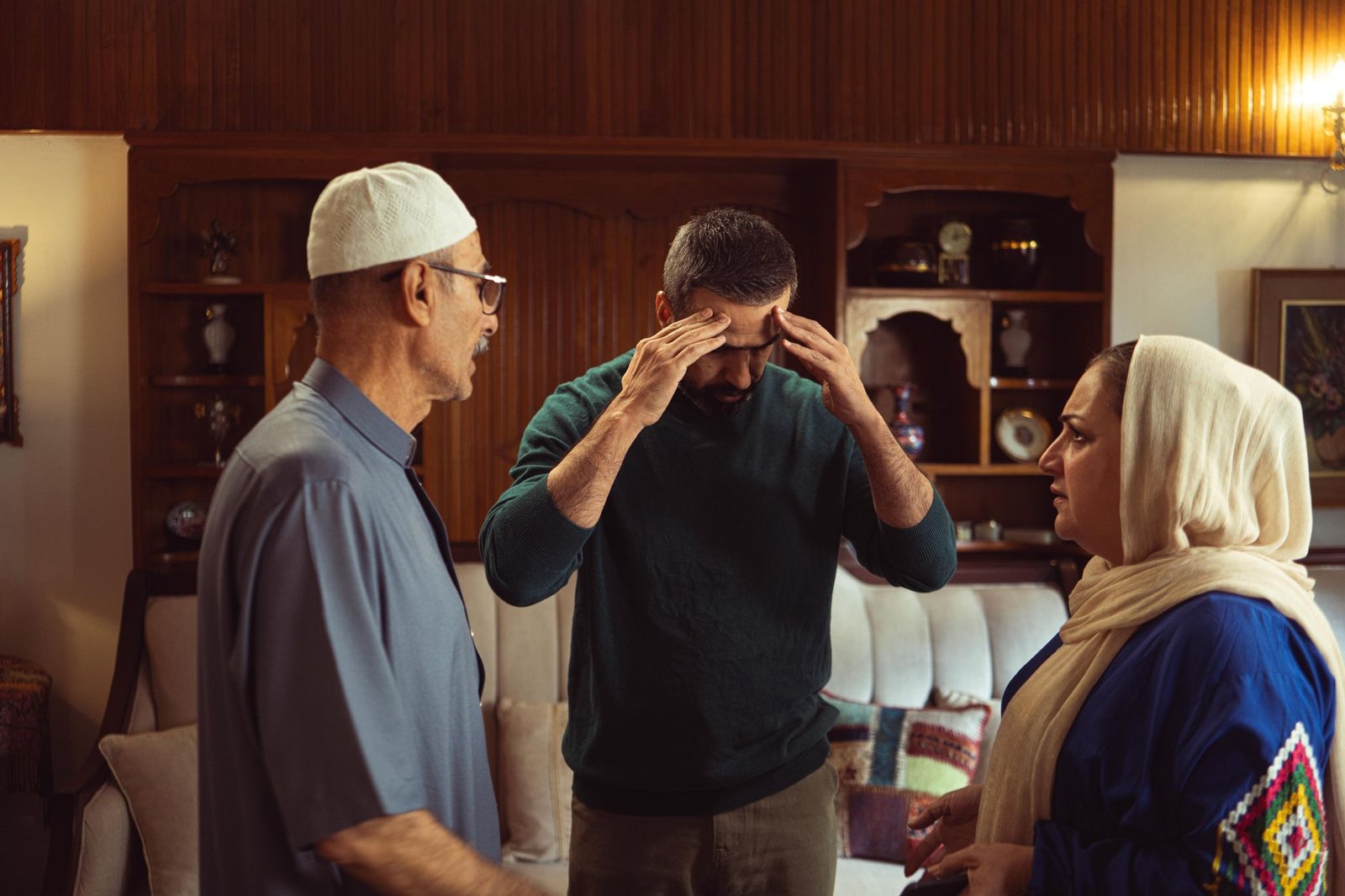 Two adults having a calm, respectful conversation indoors