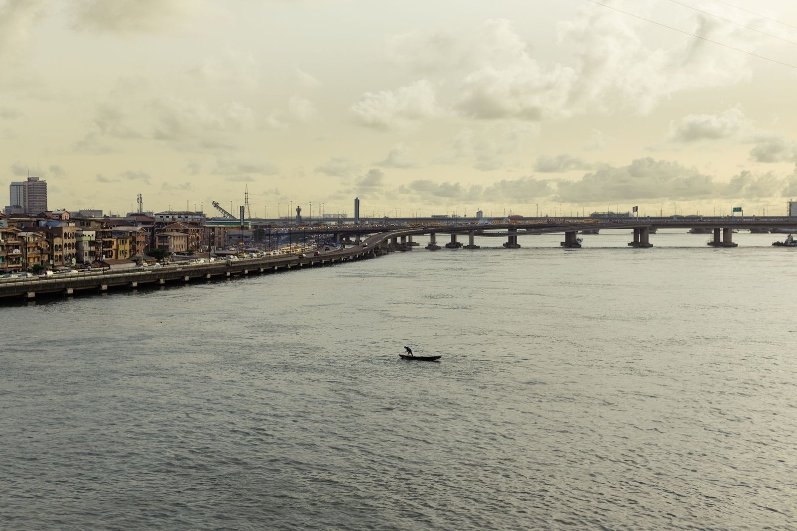 Daytime street view of Victoria Island, Lagos, with office towers and light traffic
