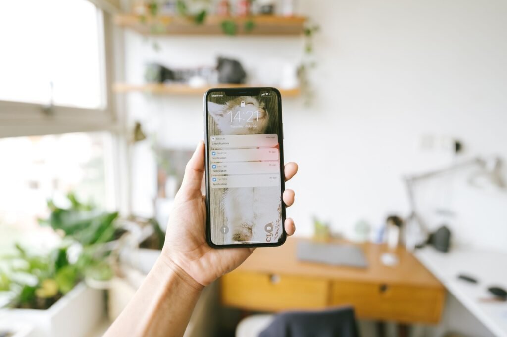 Person reading a listing on a smartphone at home